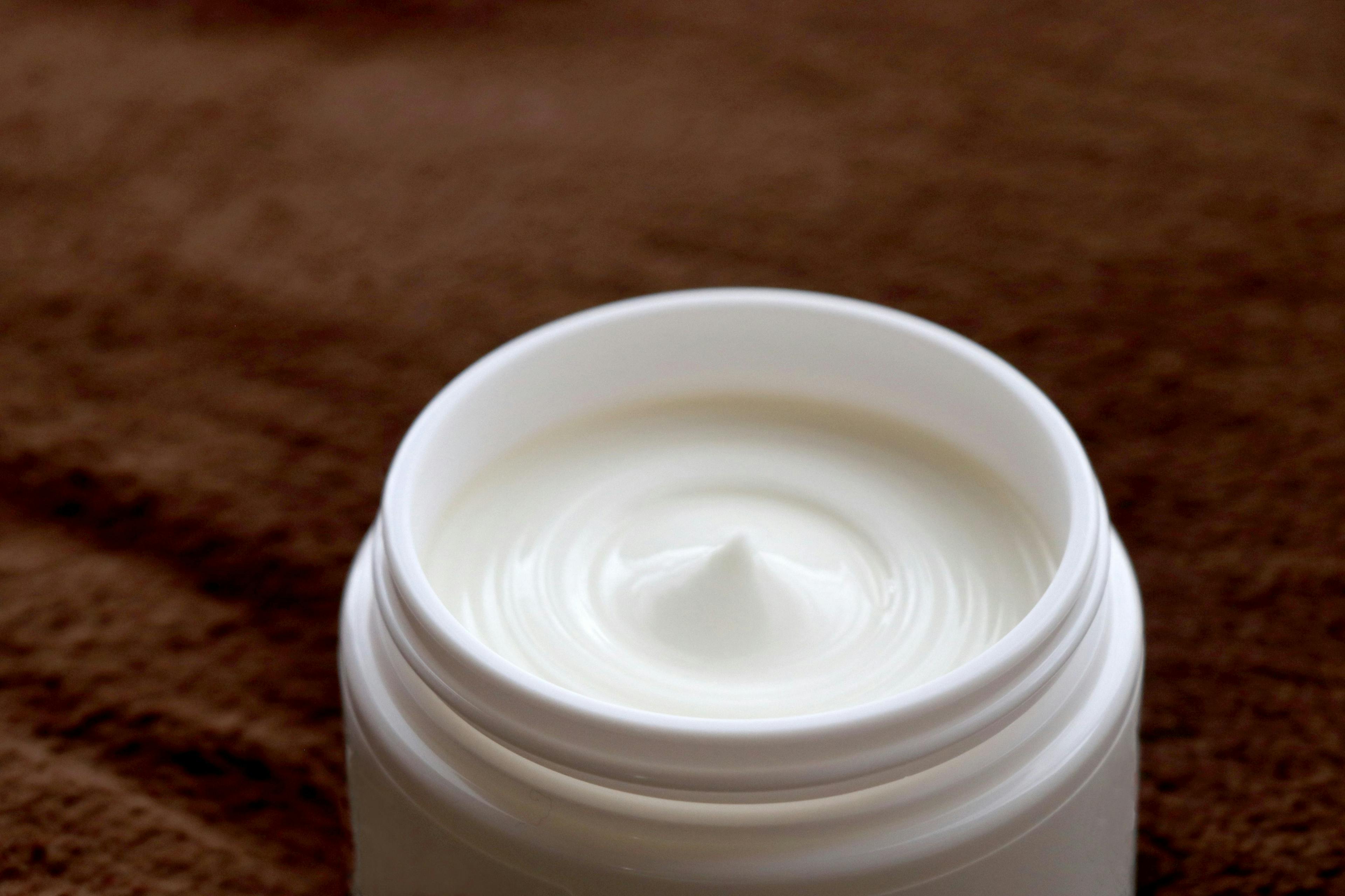 Unlabeled container of skin cream