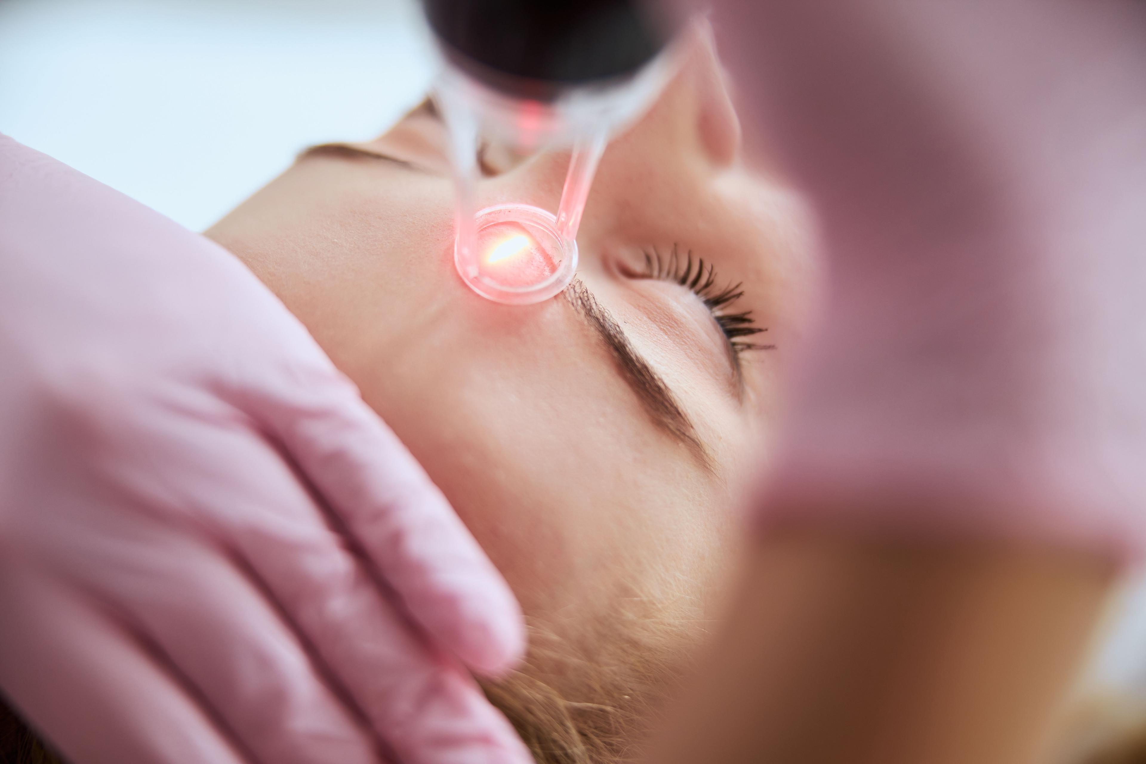 Patient receiving laser treatment | Image Credit: © Viacheslav Yakobchuk - stock.adobe.com