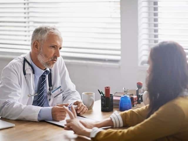 Dermatologist and patient | Image Credit: © Miiskin - dermnetnz.org