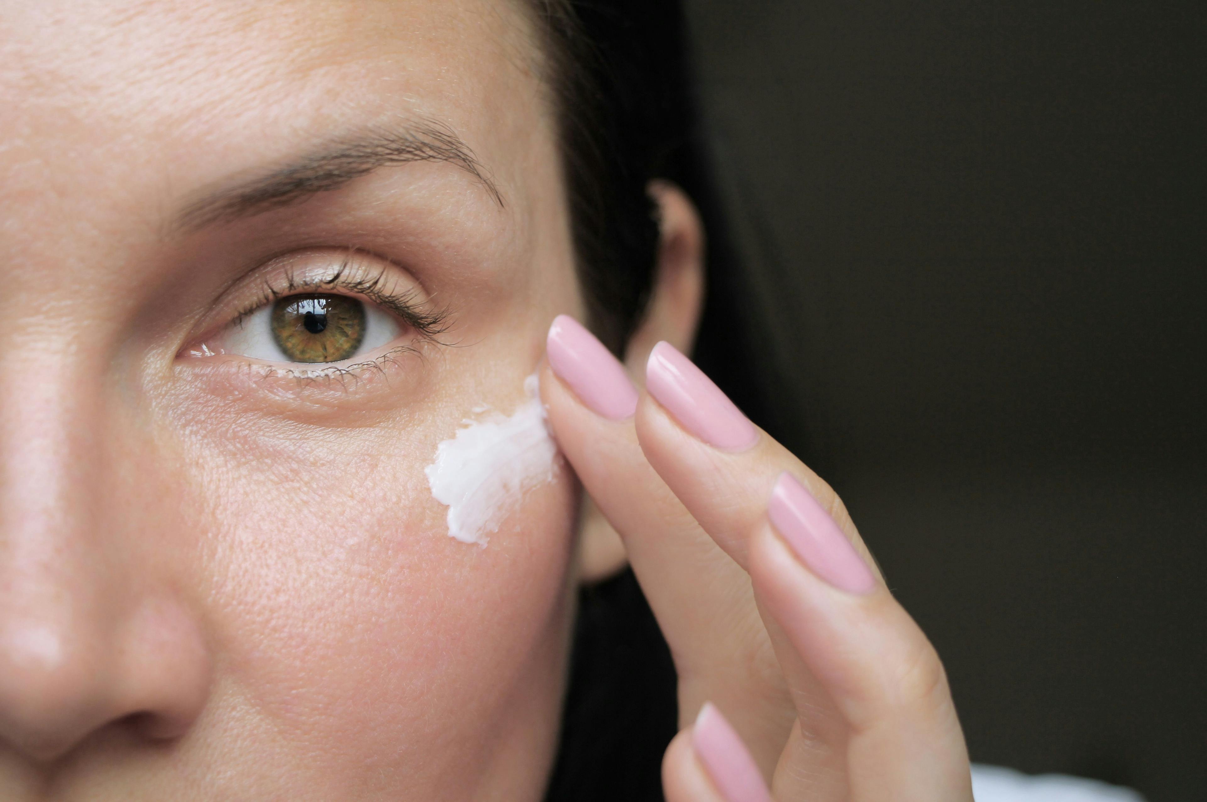 Woman using eye cream | Image Credit: © Angelina - stock.adobe.com